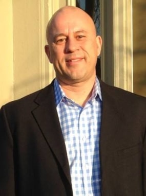 Headshot of Greg Thomson, owner of RSVP Dayton